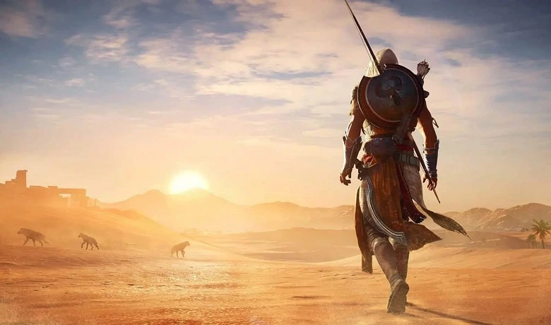 Bayek, protagonis Assassin's Creed Origins, berjalan di gurun menuju matahari. 